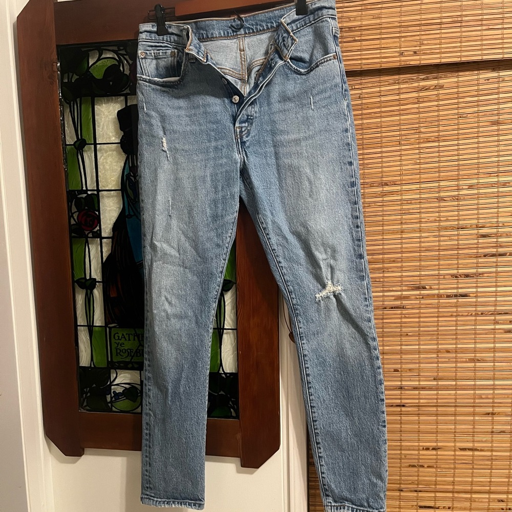 Levi's High-Rise Faded Blue Distressed Jeans